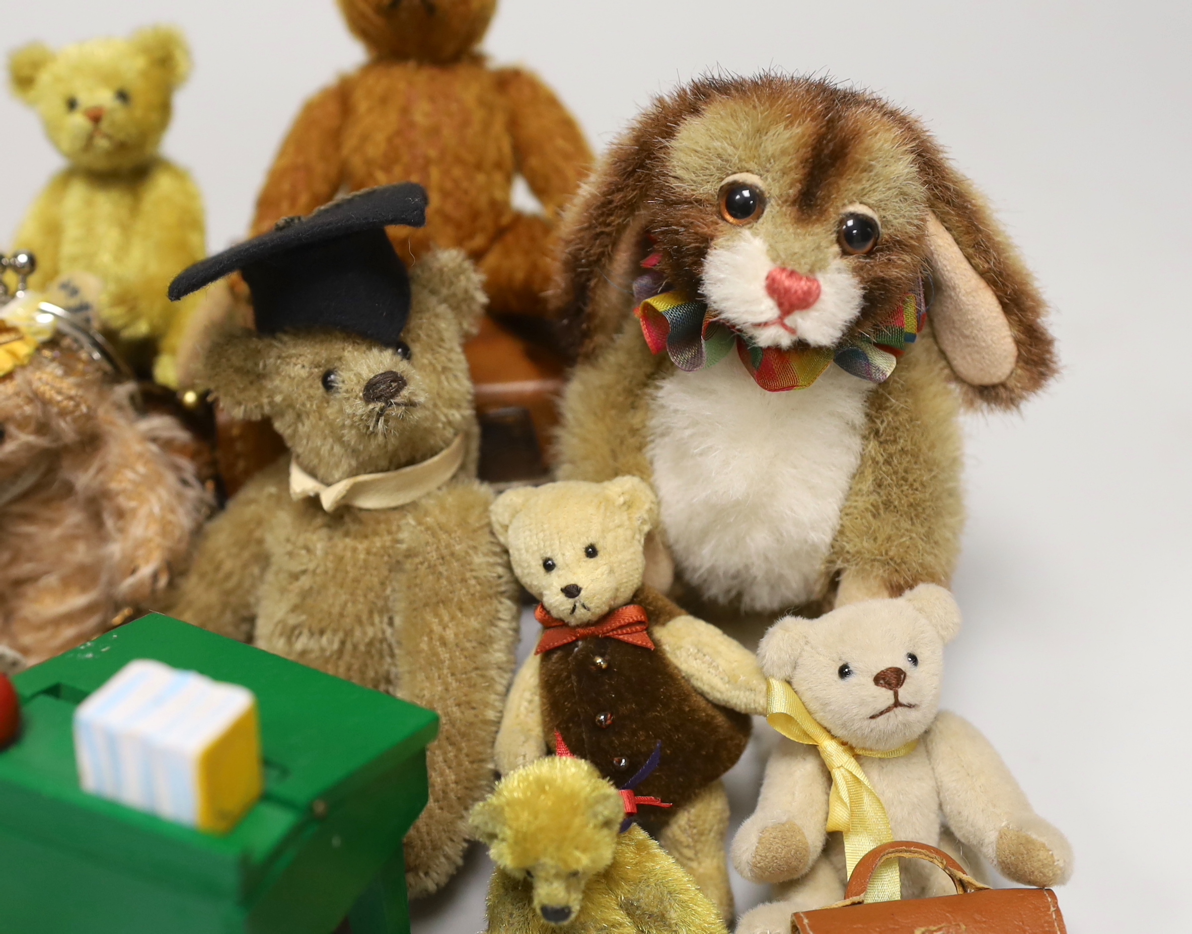 Twelve miniature American artist's bears and one rabbit